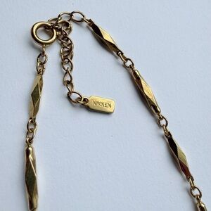 Nikken Gold Tone Chain
